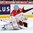MONTREAL, CANADA - DECEMBER 30: Denmark's Kasper Krog #31 makes the blocker save on this play during preliminary round action against Switzerland at the 2017 IIHF World Junior Championship. (Photo by Francois Laplante/HHOF-IIHF Images)

